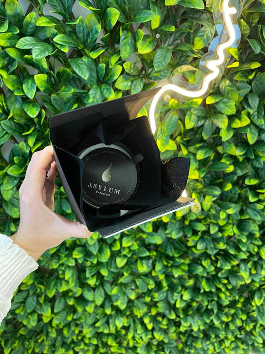 Clinique Elan signature scent candle Asylum